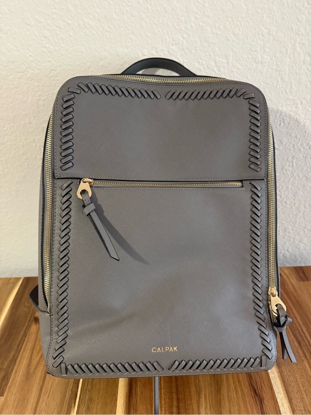 Calpak Kaya Gray Backpack with Braided Trim and Gold Hardware